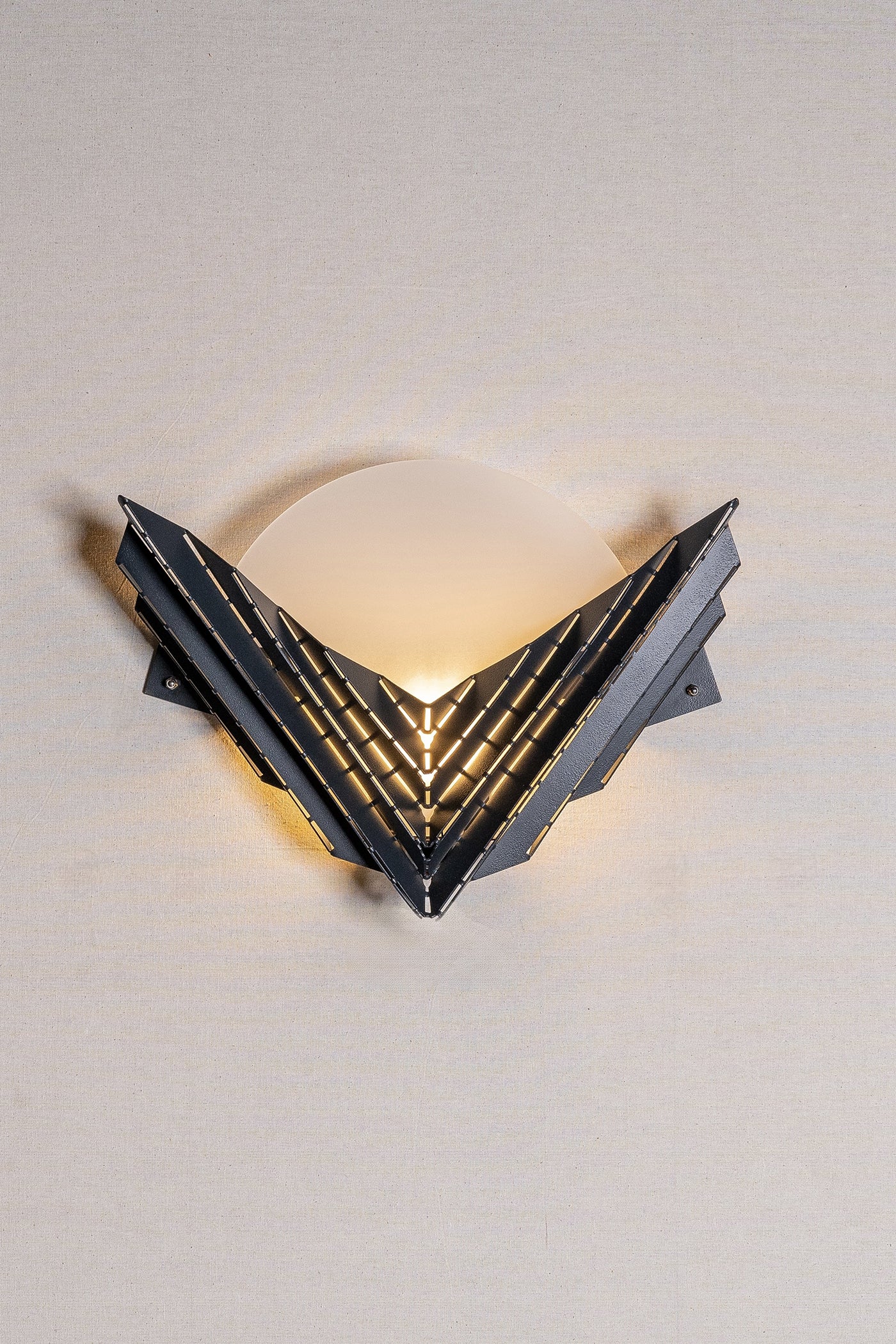 Wingle wall sconce