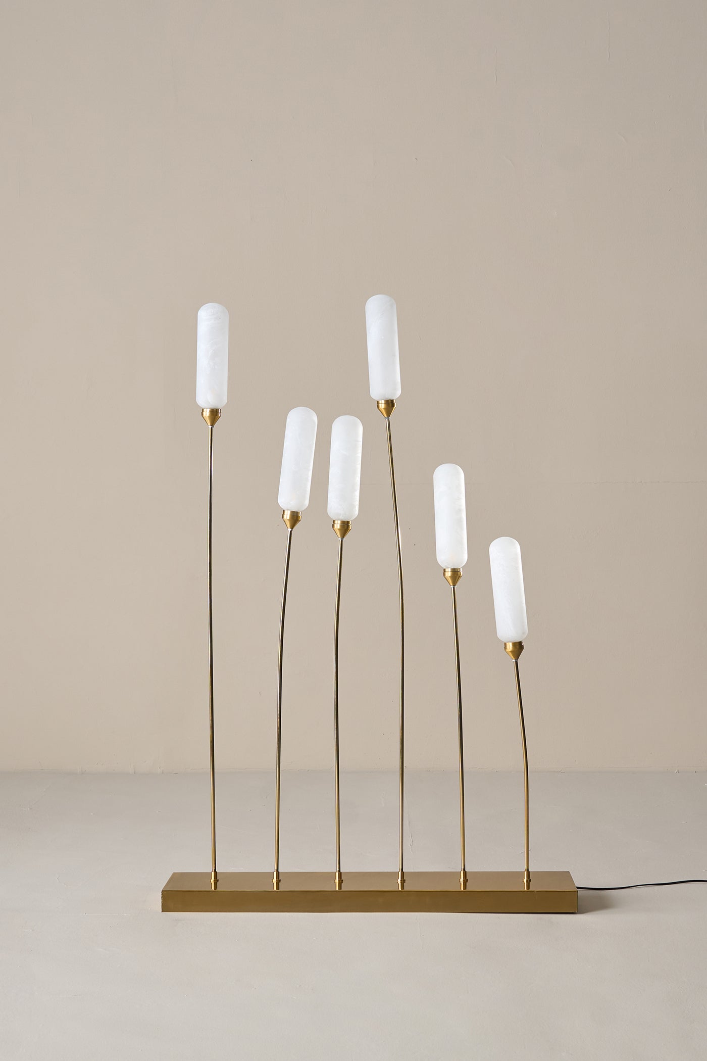 Kinara Outdoor
Floor Lamp
Gold and White